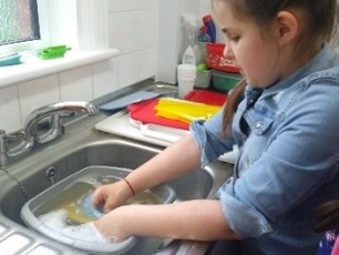 Girl washing up