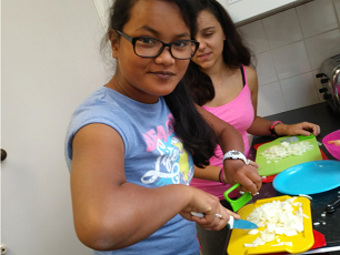 two girls preparing food